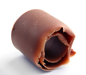 Chocolate curl isolated on white