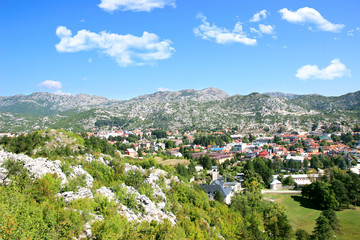 Fototapeta na wymiar Cetinje, Montenegro. View to the city center from mausoleum of bishop Danilo. City view. Town view. Mountain view.