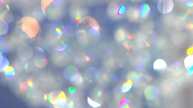 Hanging diamonds with blinking color shining reflection