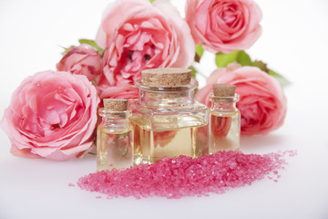 Obraz na płótnie Canvas Cosmetic oil for cosmetic procedures , aromatic bath salt and ro