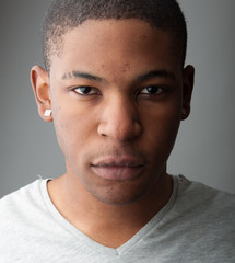 Naklejka premium Close up Headshot portrait of a handsome black man