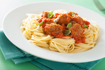 spaghetti with meatballs in tomato sauce