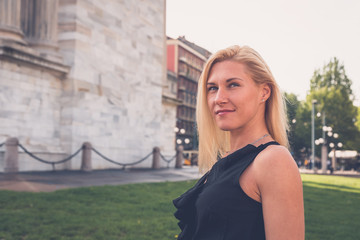 Beautiful girl posing in the city streets