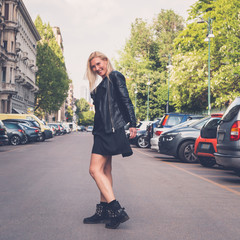 Beautiful girl posing in the city streets