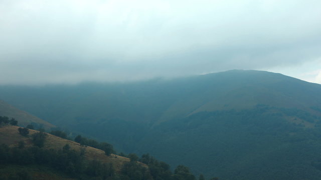 Timelapse of storm clouds in mountains