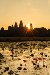 Sunrise in Angkor Wat with water lilies