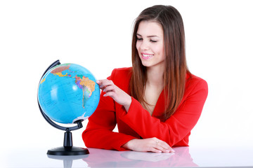Girl touching a globe. Isolated on white background