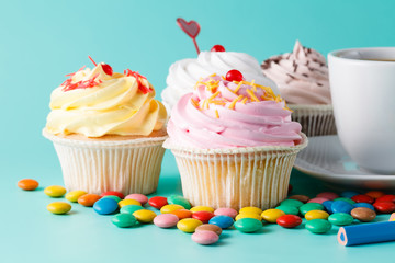 Lot of colorful cupcakes. Closeup view
