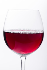 Glass of red wine view close-up 