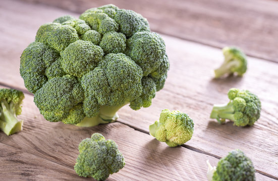 Fresh broccoli on the wooden background