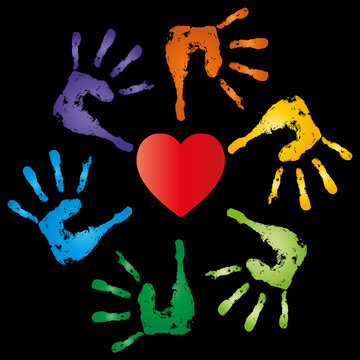 Conceptual children painted hand print and heart isolated