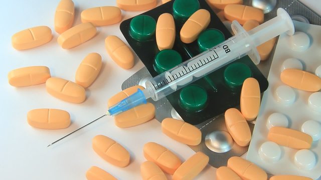 Medical syringe and tablets