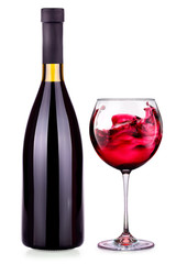 Elegant red wine glass and bottle isolated