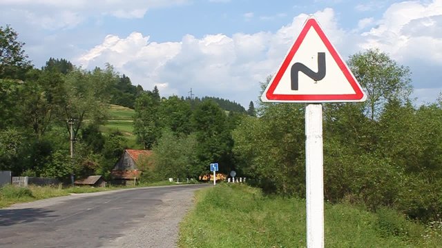 Road sign - hairpin bend