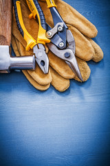 Variety of tools for repairing on wooden board copyspace