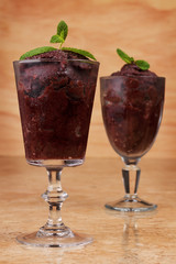 Acai pulp in glass with fresh mint
