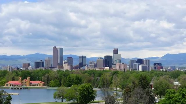 Wide angle view of downtown Denver, the Mile High City, with zoom in to downtown skyscrapers. 4K UHD time lapse.