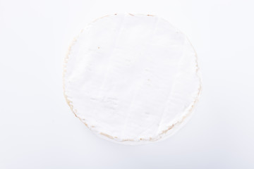 Brie cheese on white background.selective focus.