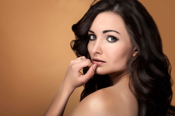 Beauty portrait of sensual brunette woman.