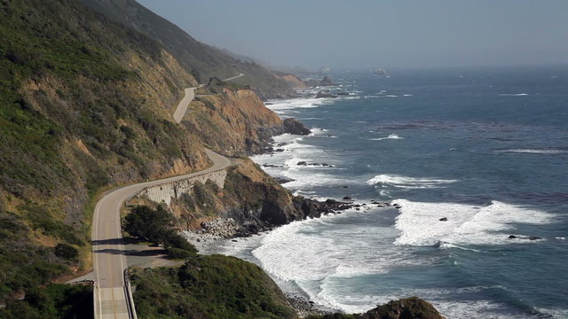 Late afternoon view of Pacific Coast Highway (aka Highway 1) on the Central California, USA coastline in the Big Sur area.