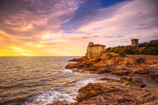 Boccale castle landmark on cliff rock and sea on warm sunset. Tu