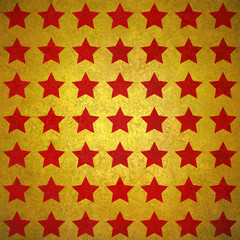 shiny red stars on gold background