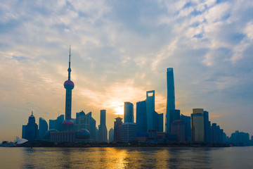 Naklejka premium Sunrise Skyline view from Bund waterfront on Pudong New Area- the business quarter of the Shanghai