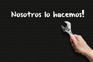 We wil do it! - Man holding a wrench