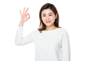 Woman showing ok sign gesture