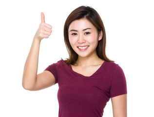 Young woman showing finger up