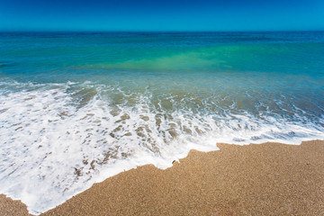 Soft Sea Ocean Waves Wash Over Golden Sand Background. Waves of 
