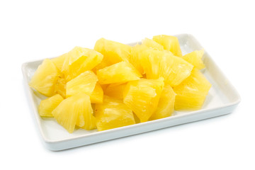 Pineapple slices in a white background.