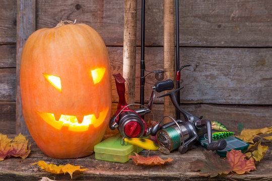 halloween pumpkin with fishing tackles