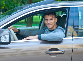 young man in his car