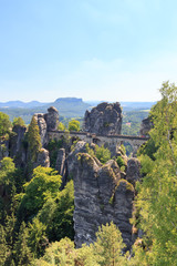 Fototapeta na wymiar Bastei bridge and table mountain Lilienstein in Rathen, Saxon Switzerland