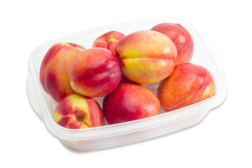 Tray with ripe nectarines