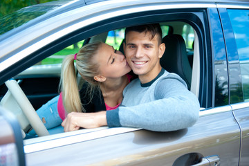 young couple in car