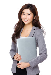 Asian young businesswoman hold with laptop computer