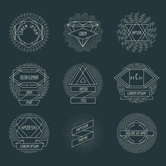 Retro hipster logos and labels with radial sunbusrt