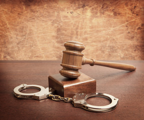 Gavel and handcuffs