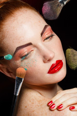 Professional colorful makeup for red-haired models
