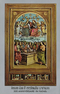 Laos - CIRCA 1983: mail stamp printed in Laos featuring 500 years since the birth of Raphael. Reproduction of Raphael "The Coronation of the Virgin Mary. Oddi Altarpiece", circa 1983