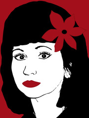 Portrait of woman with flower in hair