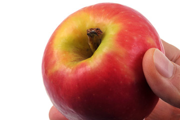 Une pomme en main
