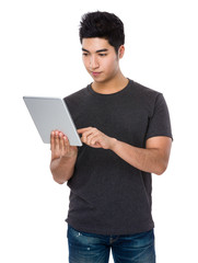 Asian man use of the tablet pc