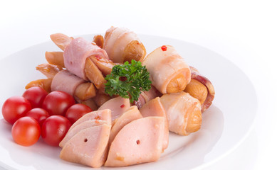 Sausage,ham,tomatoes on white background.