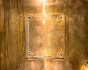 copper or bronze frame with rivets