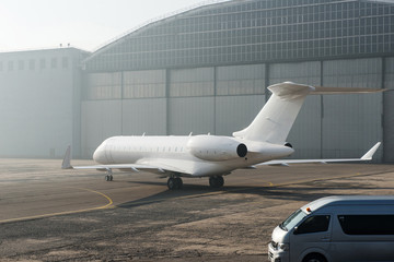 Business jet plane on the ground.