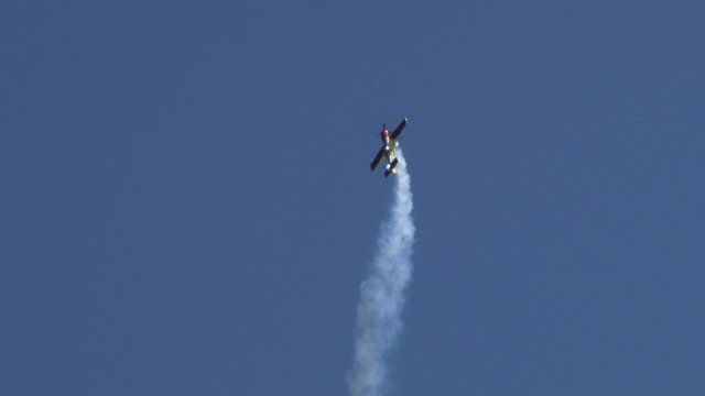 sport aircraft on a bend rapid flight up