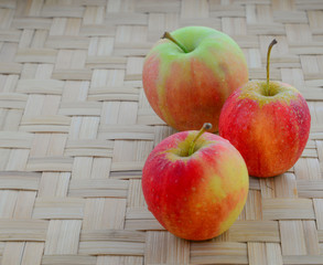 Apple on the bamboo floor.
